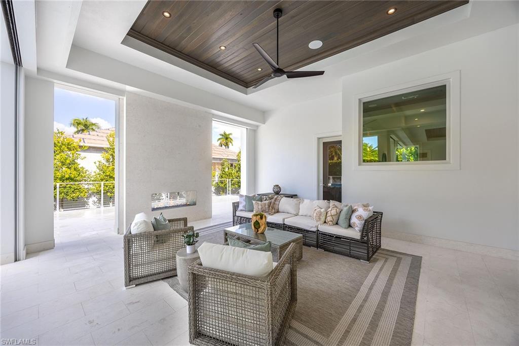 375 Bow Line Drive Naples, FL 34103 - Photo 40 of 48 Outdoor Living Area with Fireplace
