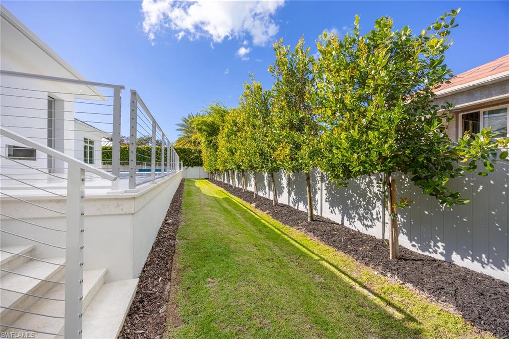 375 Bow Line Drive Naples, FL 34103 - Photo 45 of 48 Down the steps is a spacious dog run.