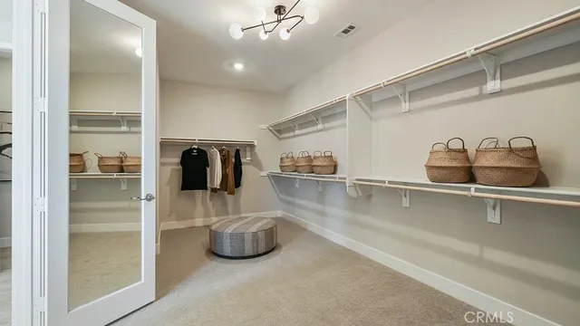 a kitchen with refrigerator and window
