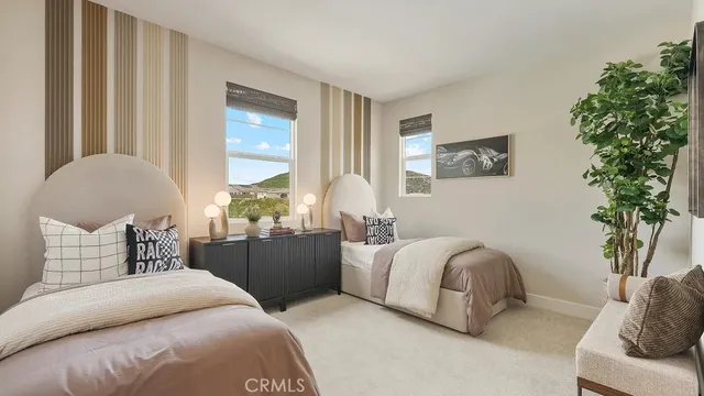 a bedroom with bed and window