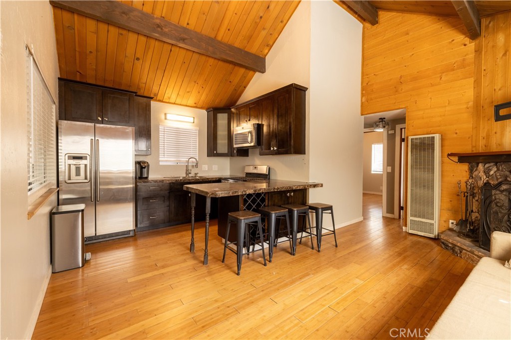 32905 Chipmunk Lane Running Springs, CA 92382 - Photo 6 of 20 Open Concept Kitchen to living room.