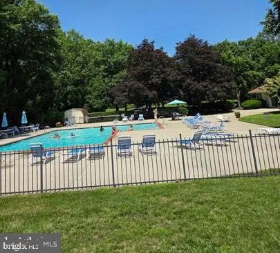 a view of a wooden fence