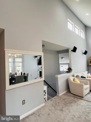 a room with a cabinets and a couch