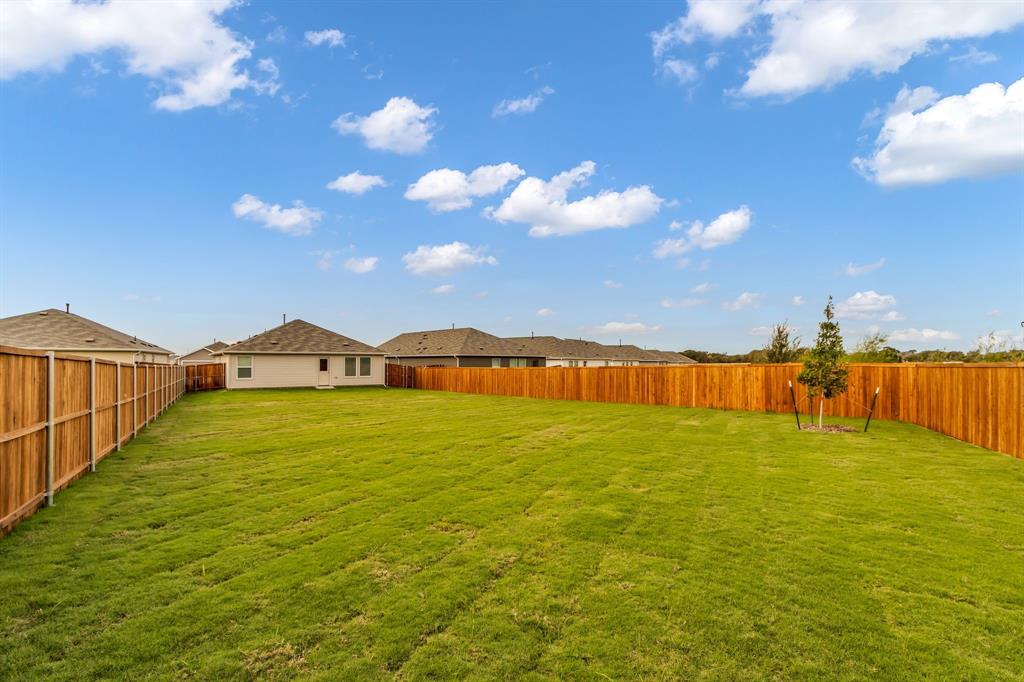 11325 Rodeo Drive Providence Village, TX 76227 - Photo 26 of 40 a view of swimming pool with an outdoor space and seating area