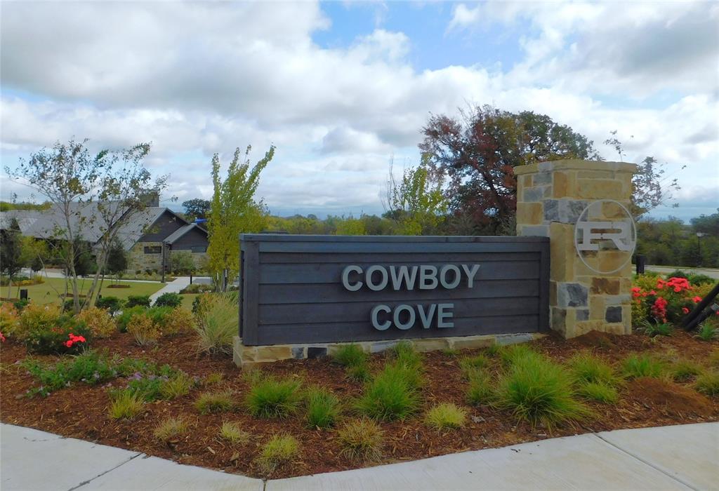 11325 Rodeo Drive Providence Village, TX 76227 - Photo 32 of 40 a sign that is sitting in front of a building