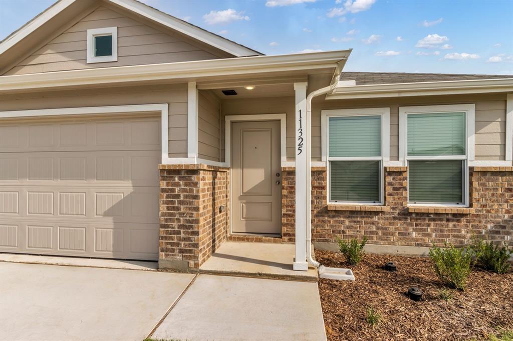 11325 Rodeo Drive Providence Village, TX 76227 - Photo 4 of 40 a view of a door of the house