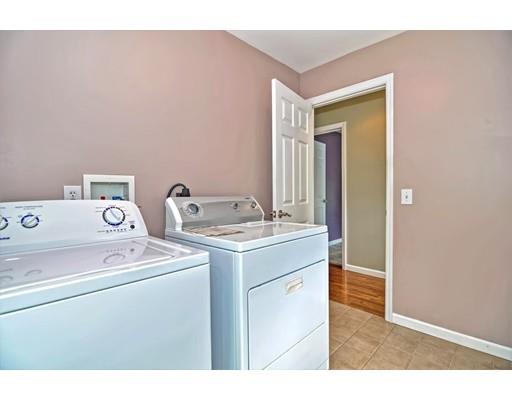 22 Riverside Street Danvers, MA 01923 - Photo 14 of 20 a utility room with dryer and washer