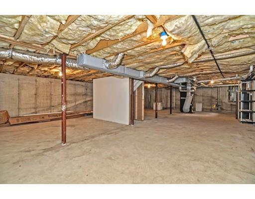 22 Riverside Street Danvers, MA 01923 - Photo 17 of 20 a view of a room with wooden walls