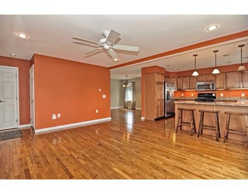 22 Riverside Street Danvers, MA 01923 - Photo 6 of 20 a view of a kitchen with furniture and a window