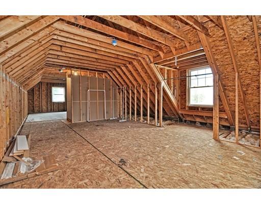 22 Riverside Street Danvers, MA 01923 - Photo 9 of 20 a view of a house with a backyard