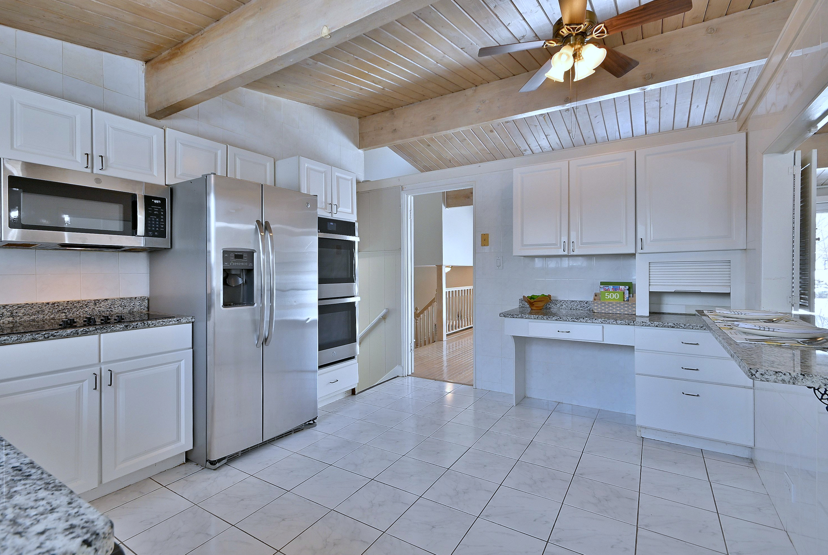 521 Michael Manor Glenview, IL 60025 - Photo 14 of 52 a kitchen with cabinets and stainless steel appliances