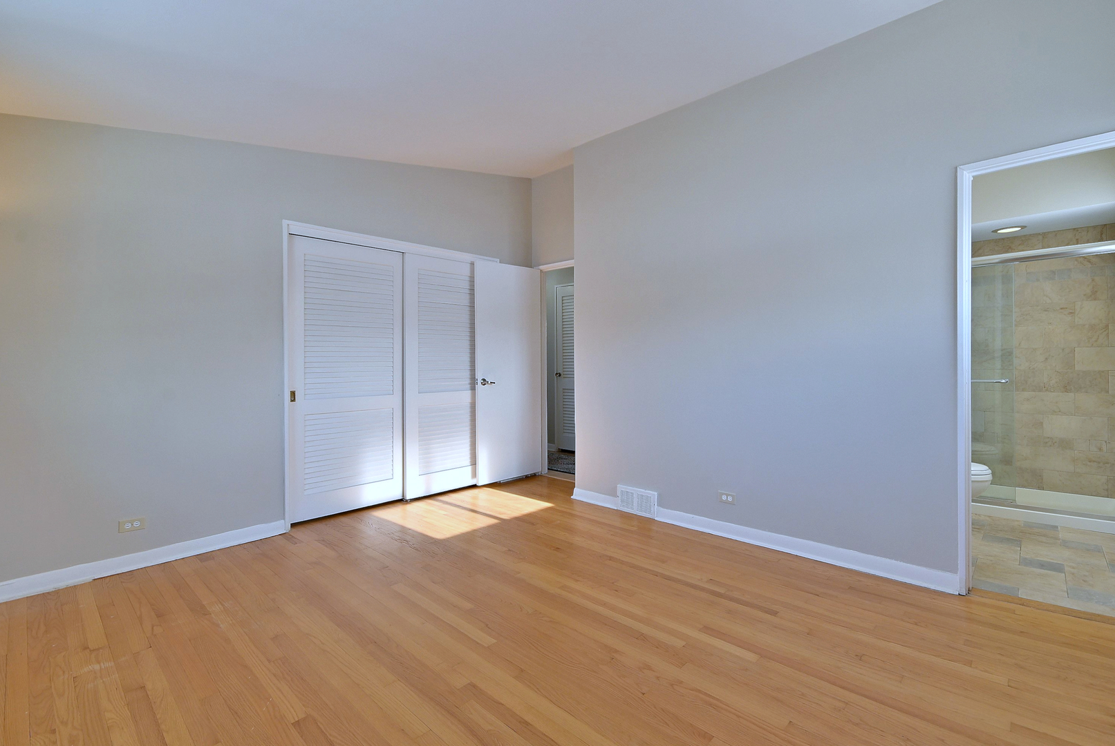 521 Michael Manor Glenview, IL 60025 - Photo 23 of 52 a view of an empty room with wooden floor