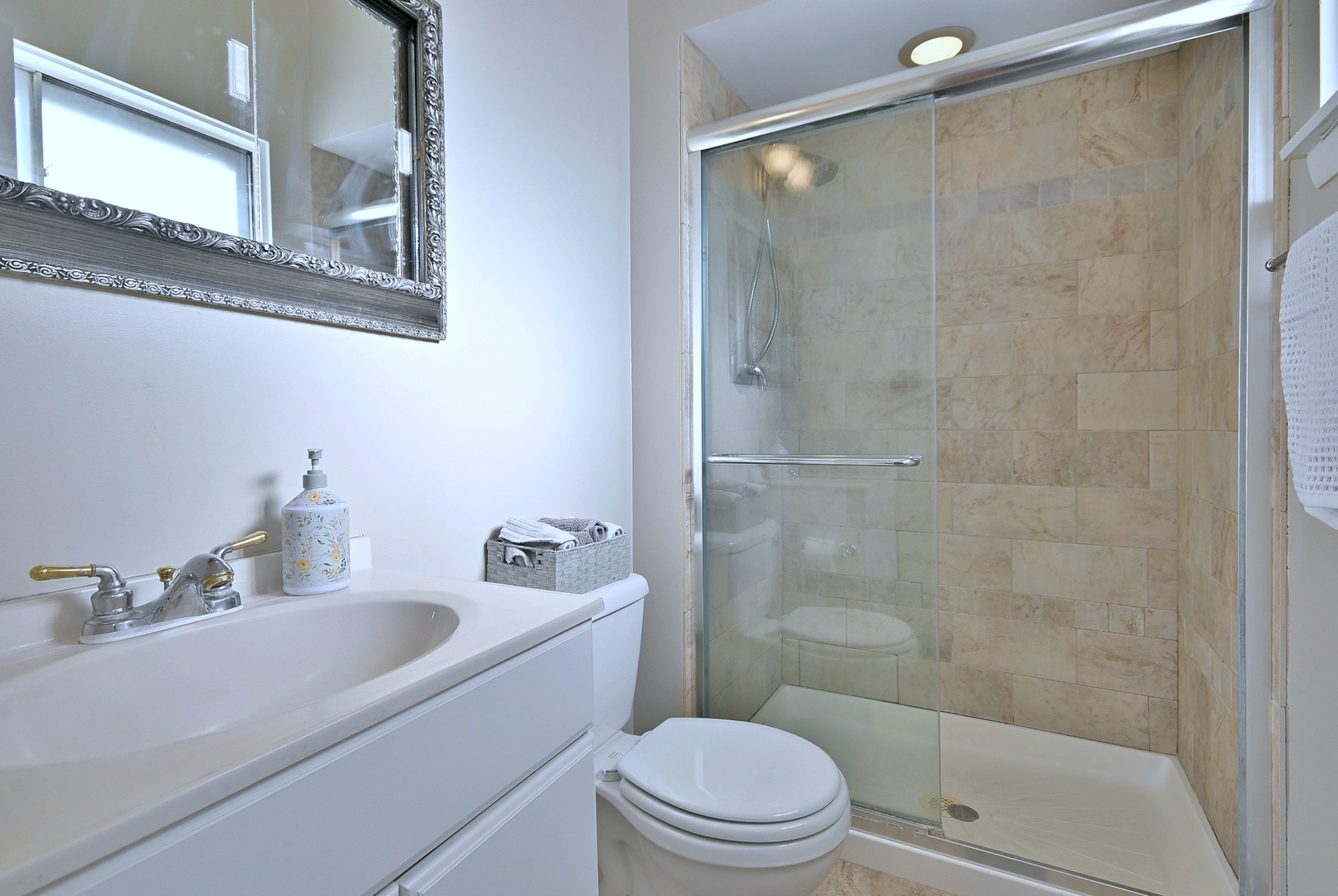 521 Michael Manor Glenview, IL 60025 - Photo 24 of 52 a bathroom with a sink a toilet and shower