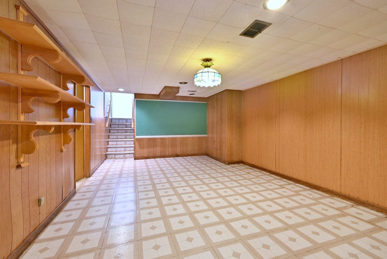 521 Michael Manor Glenview, IL 60025 - Photo 38 of 52 a view of a hallway with wooden floor and a chandelier