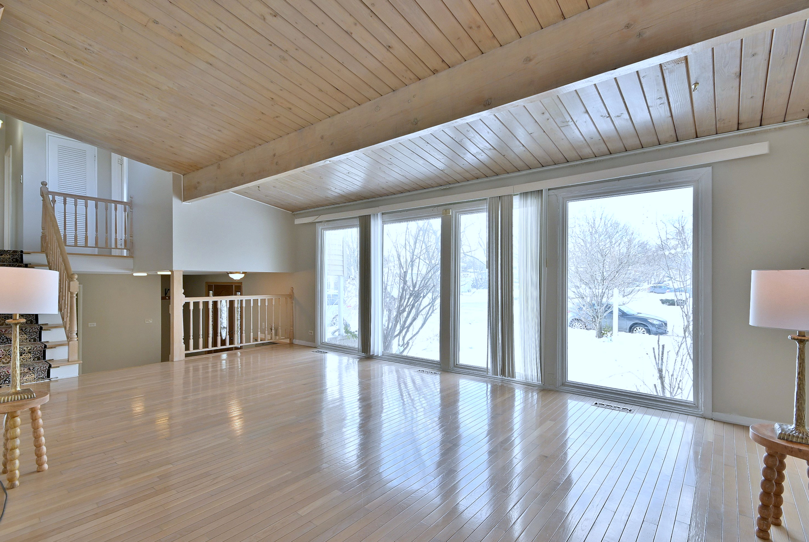 521 Michael Manor Glenview, IL 60025 - Photo 8 of 52 a view of an empty room with wooden floor and a window