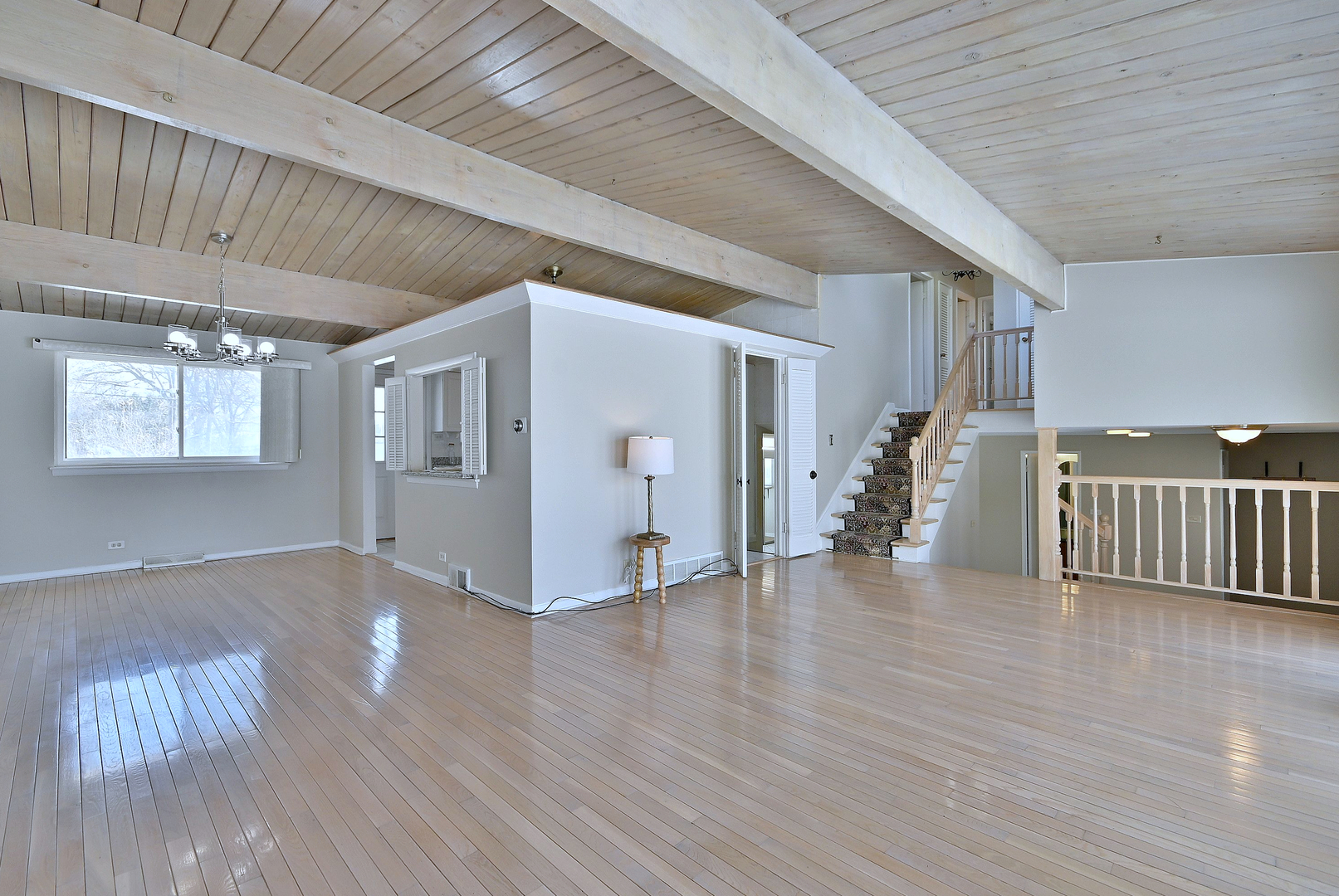 521 Michael Manor Glenview, IL 60025 - Photo 9 of 52 a view of an empty room with wooden floor and a window