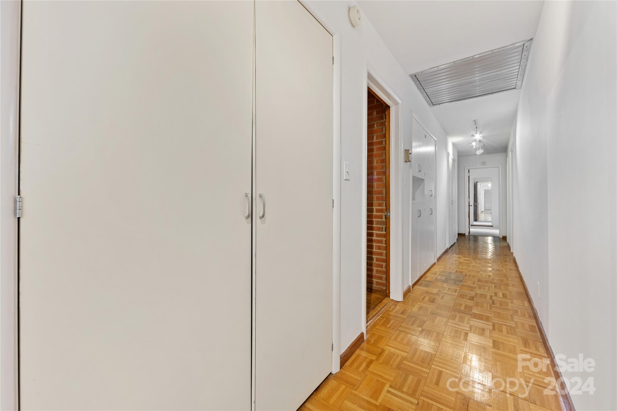 3239 Foxcroft Road Charlotte, NC 28211 - Photo 16 of 42 a view of a hallway with a dining area