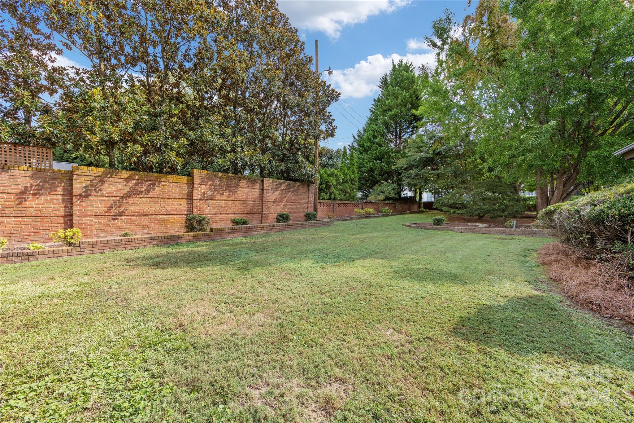 3239 Foxcroft Road Charlotte, NC 28211 - Photo 39 of 42 a view of a backyard