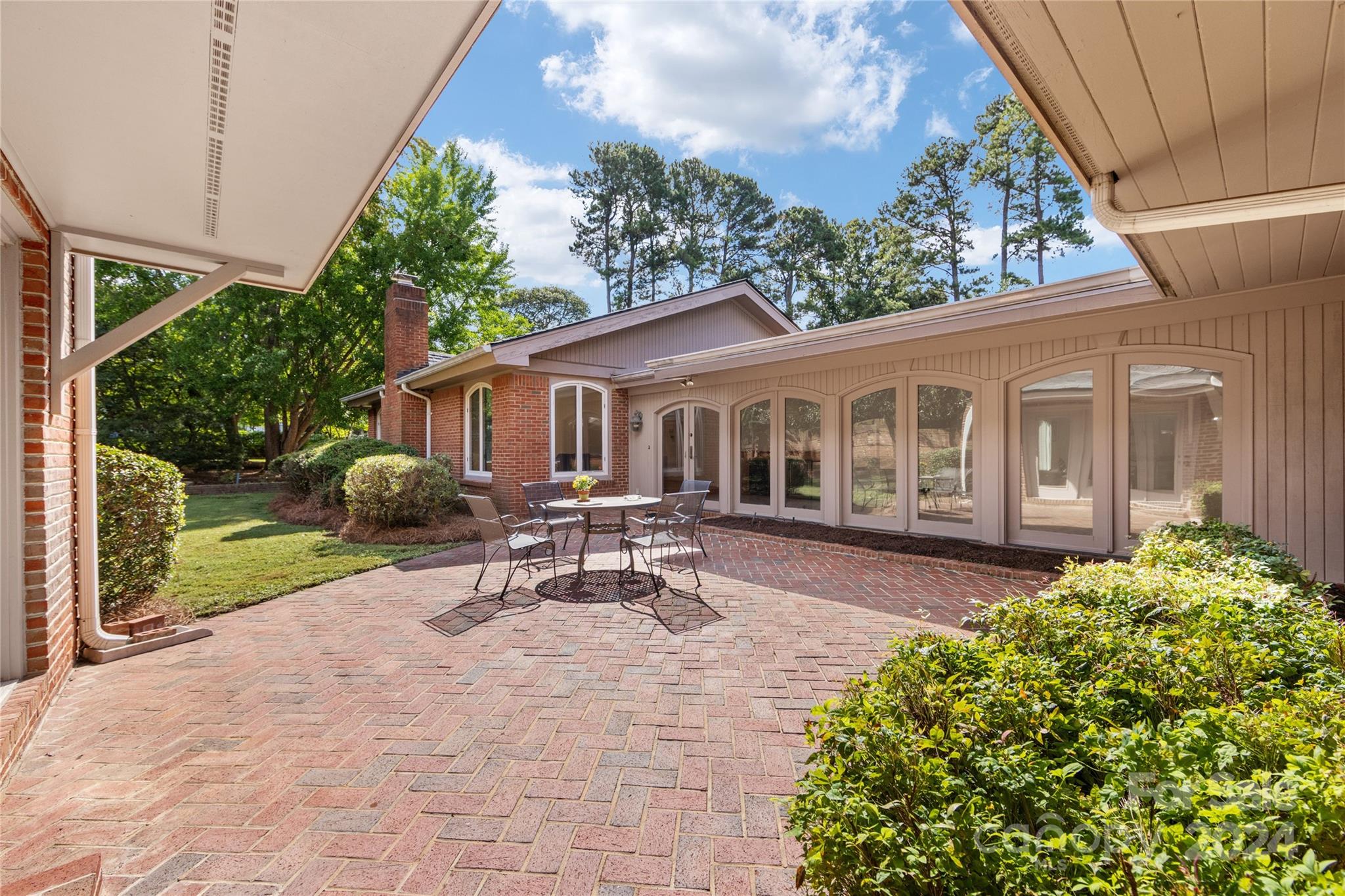 3239 Foxcroft Road Charlotte, NC 28211 - Photo 42 of 42 a view of a house with sitting area and garden