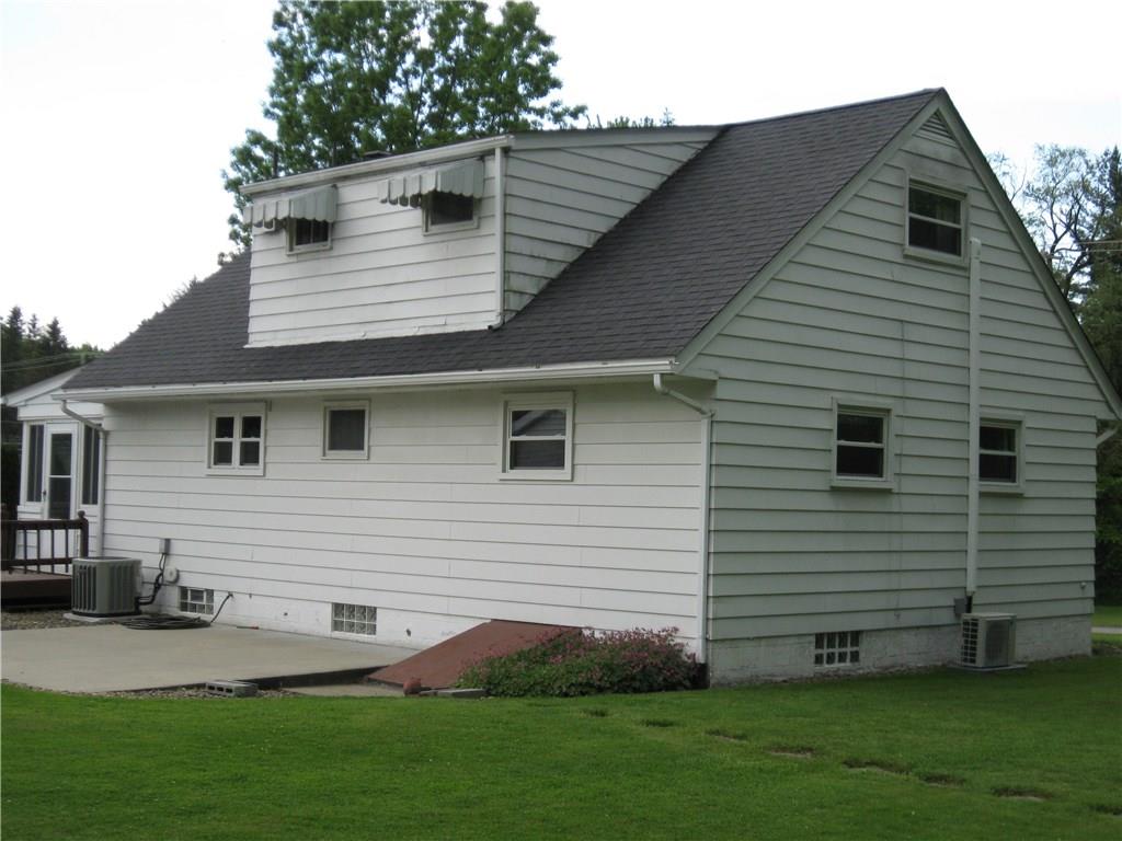 3108 Mercer Road New Castle, PA 16105 - Photo 17 of 17 Back and side view of home showing glass block windows in the basement.