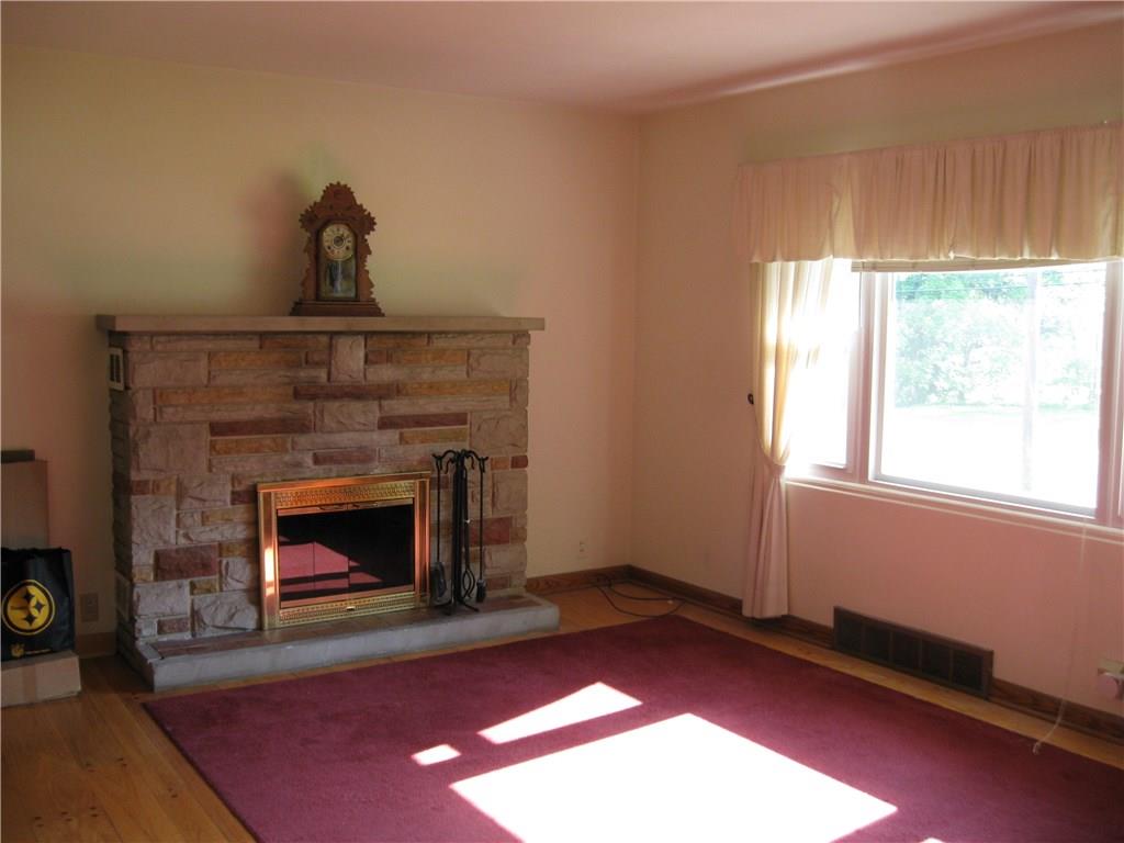 3108 Mercer Road New Castle, PA 16105 - Photo 5 of 17 Living Room with working fireplace and hardwood floors