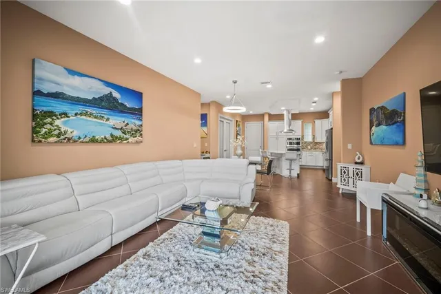 a living room with furniture and a table