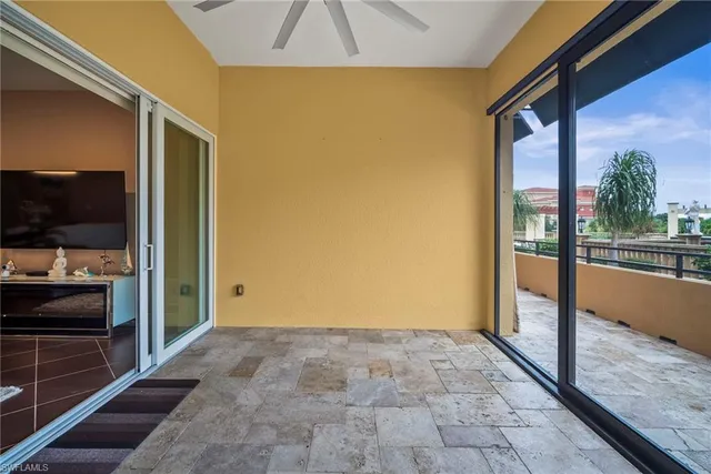 a view of balcony with furniture