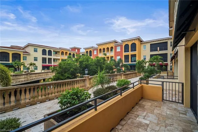 a front view of a house with a street