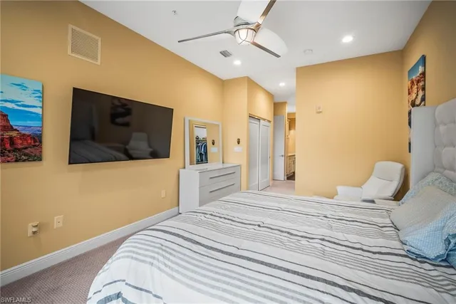a view of a hallway with closet and a livingroom view