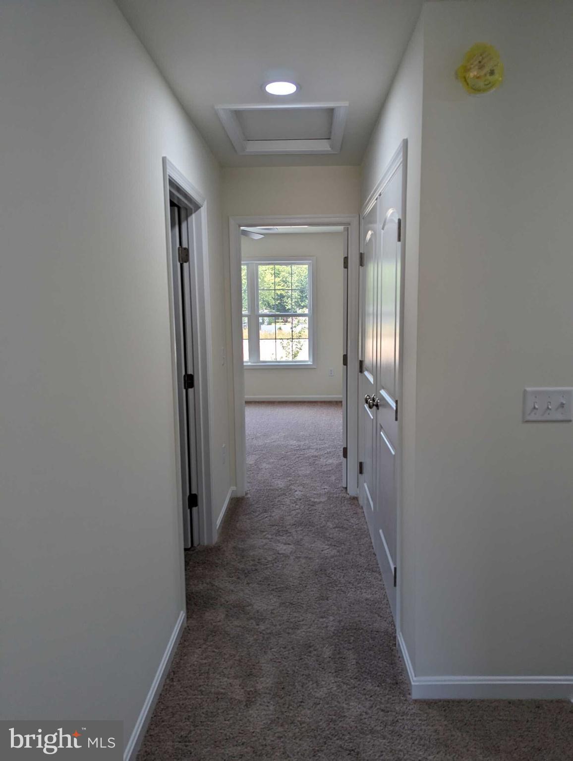 227 Rojan Road Dover, DE 19901 - Photo 12 of 20 an entryway door with a hallway in the house