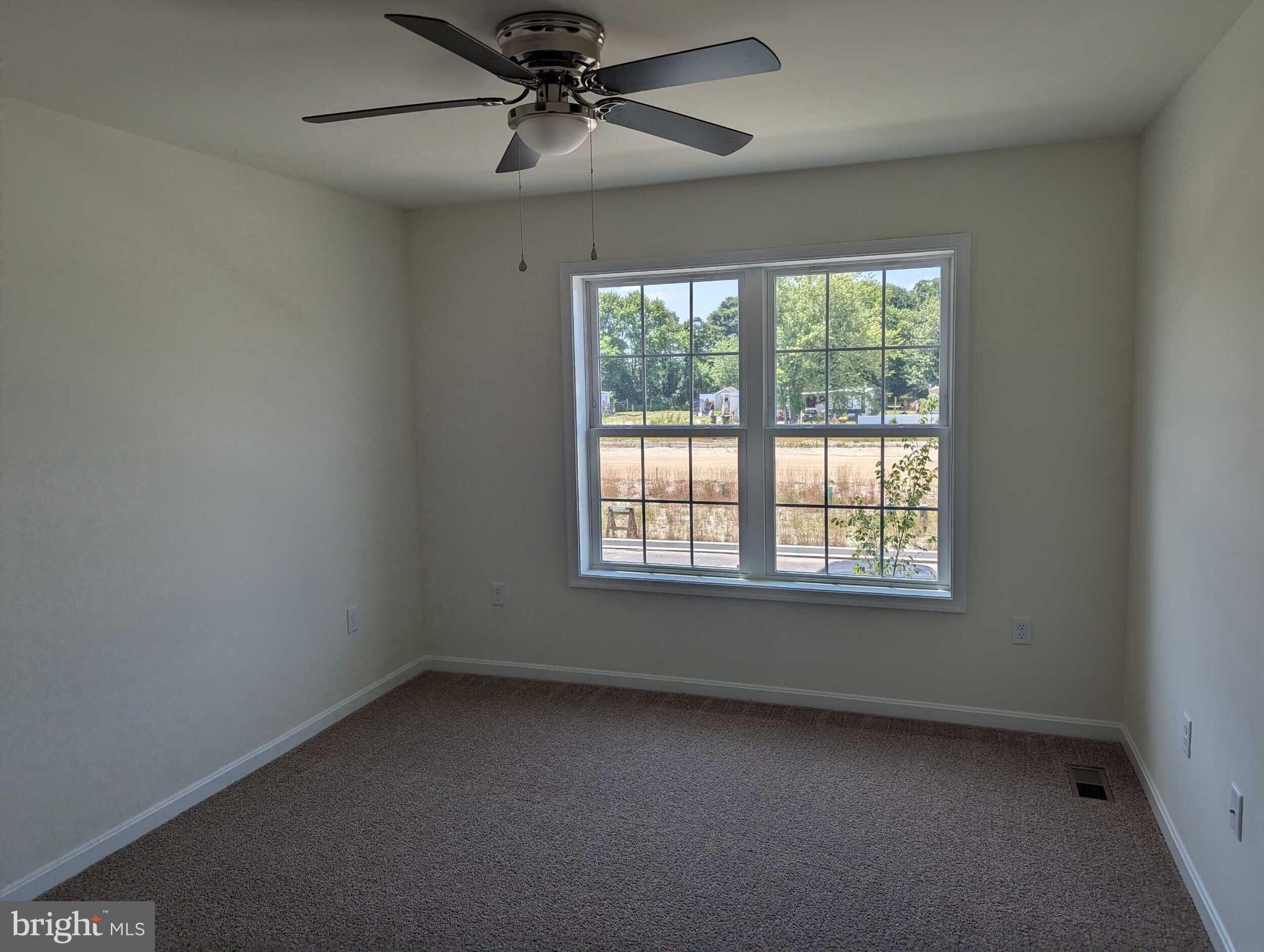 227 Rojan Road Dover, DE 19901 - Photo 14 of 20 an empty room with a window