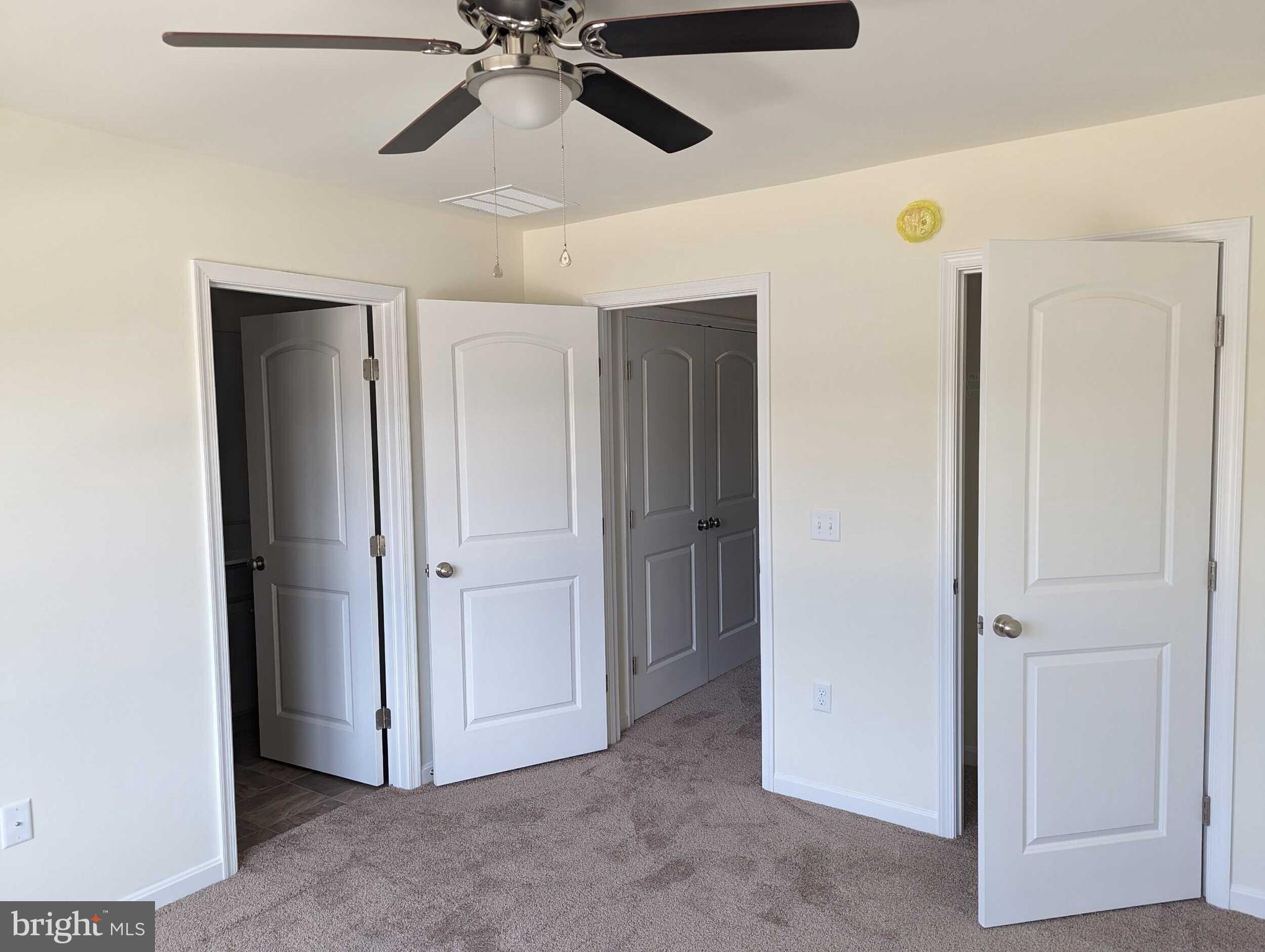 227 Rojan Road Dover, DE 19901 - Photo 15 of 20 a view of a livingroom and a chandelier fan