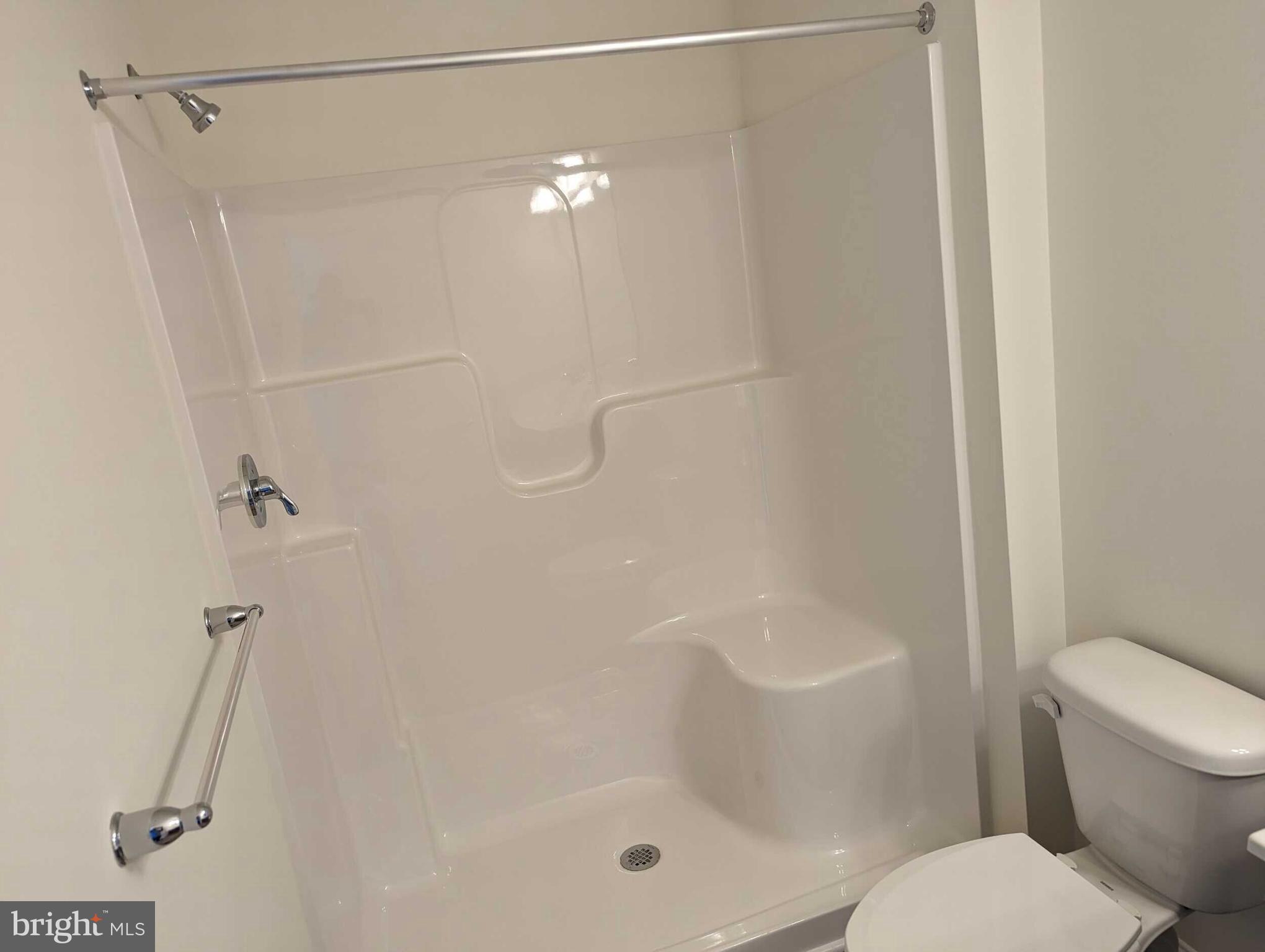 227 Rojan Road Dover, DE 19901 - Photo 17 of 20 a bathroom with a shower and toilet