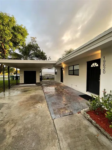 front view of a house with a street