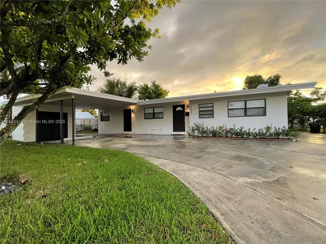 front view of a house with a patio