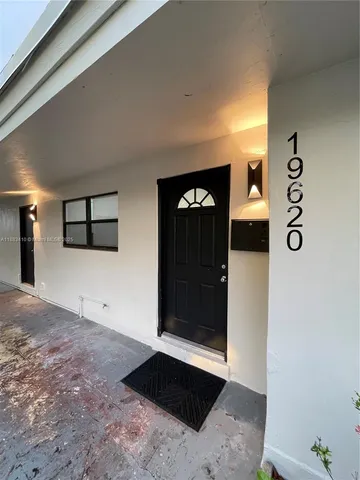 a view of a hallway with entryway