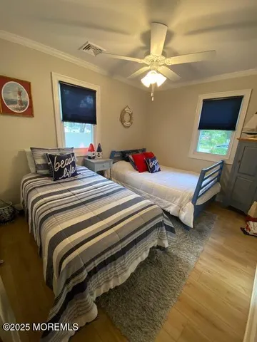 a bedroom with a bed and lamp