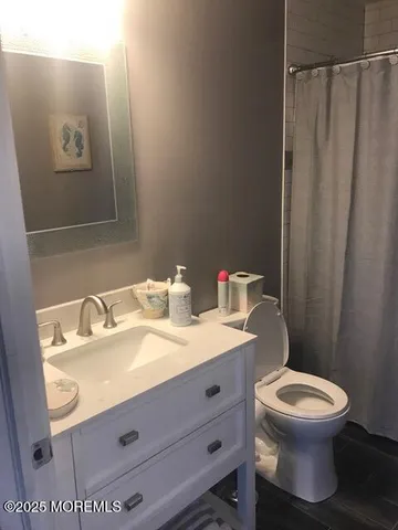 a bathroom with a sink and a toilet