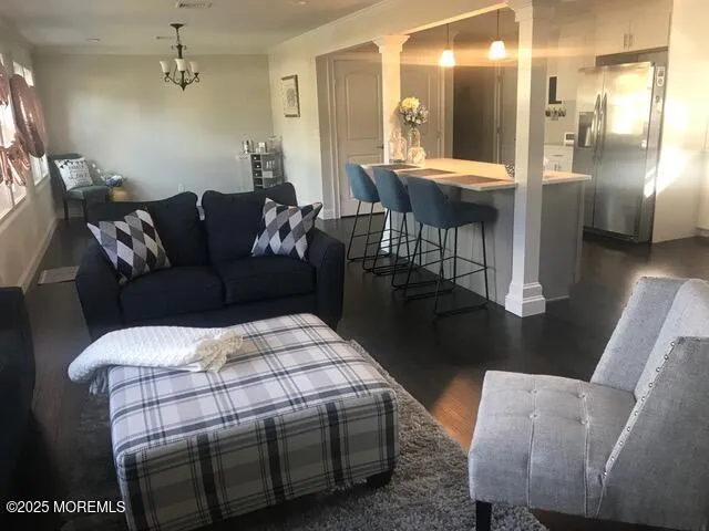 a living room with furniture and a table