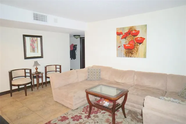 a bedroom with bed and a window