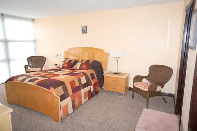 a view of an ocean and city