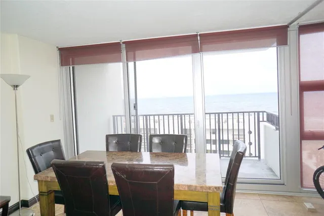 a kitchen with a sink cabinets and a window