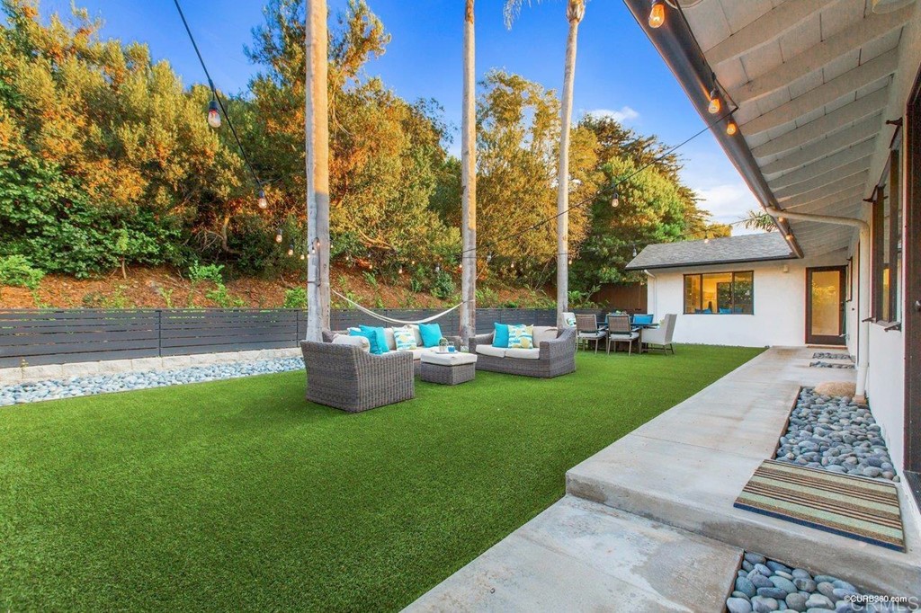 1237 Muirlands Vista Way La Jolla, CA 92037 - Photo 20 of 25 a view of a house with a yard