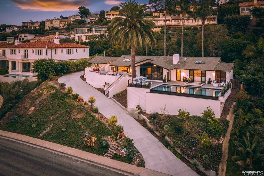 1237 Muirlands Vista Way La Jolla, CA 92037 - Photo 5 of 25 an aerial view of house with yard space and ocean view