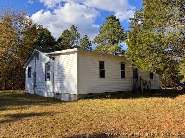 3156 Reservation Road Aberdeen, NC 28315 - Photo 3 of 15 a house view with a outdoor space