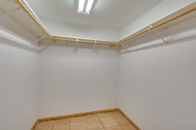 a view of an empty walk in closet