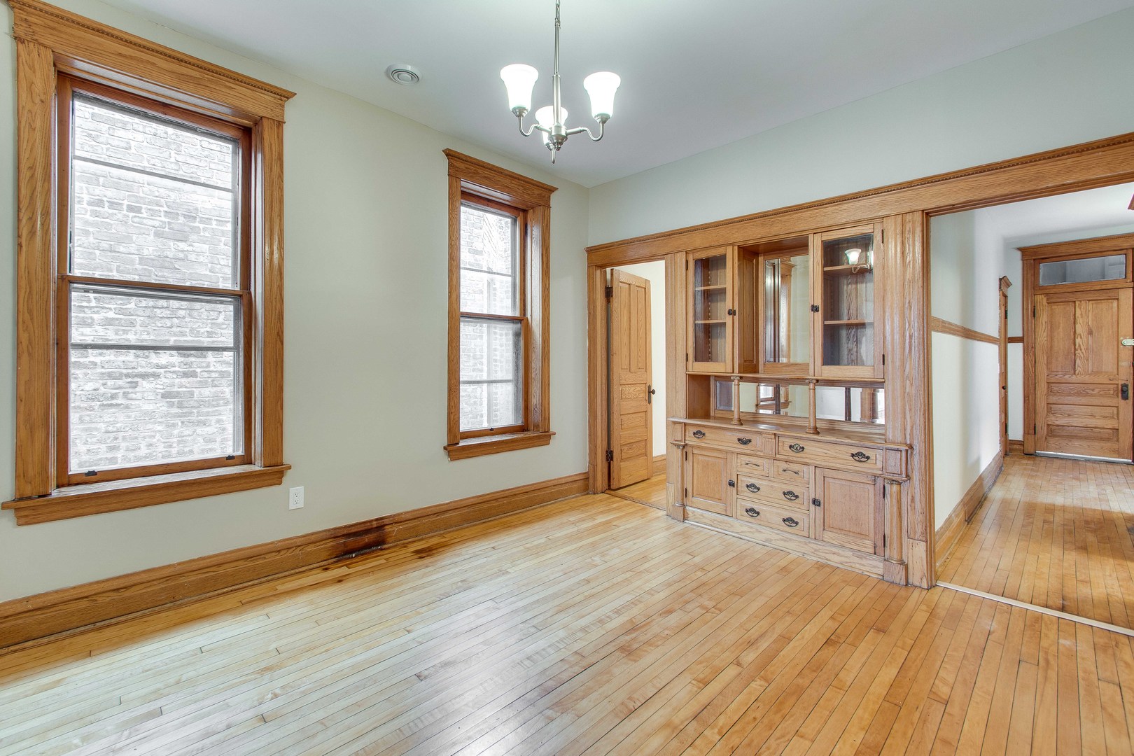 2905 West Logan Boulevard Chicago, IL 60647 - Photo 29 of 36 a view of livingroom with furniture wooden floor and windows