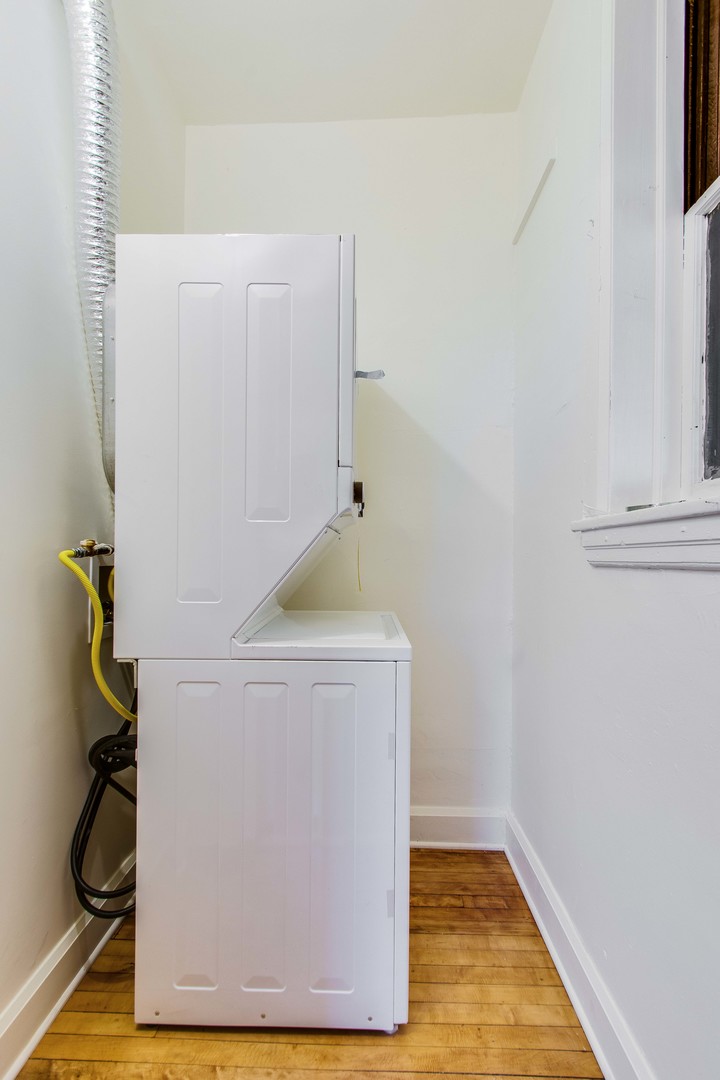 2905 West Logan Boulevard Chicago, IL 60647 - Photo 33 of 36 a utility room with a door