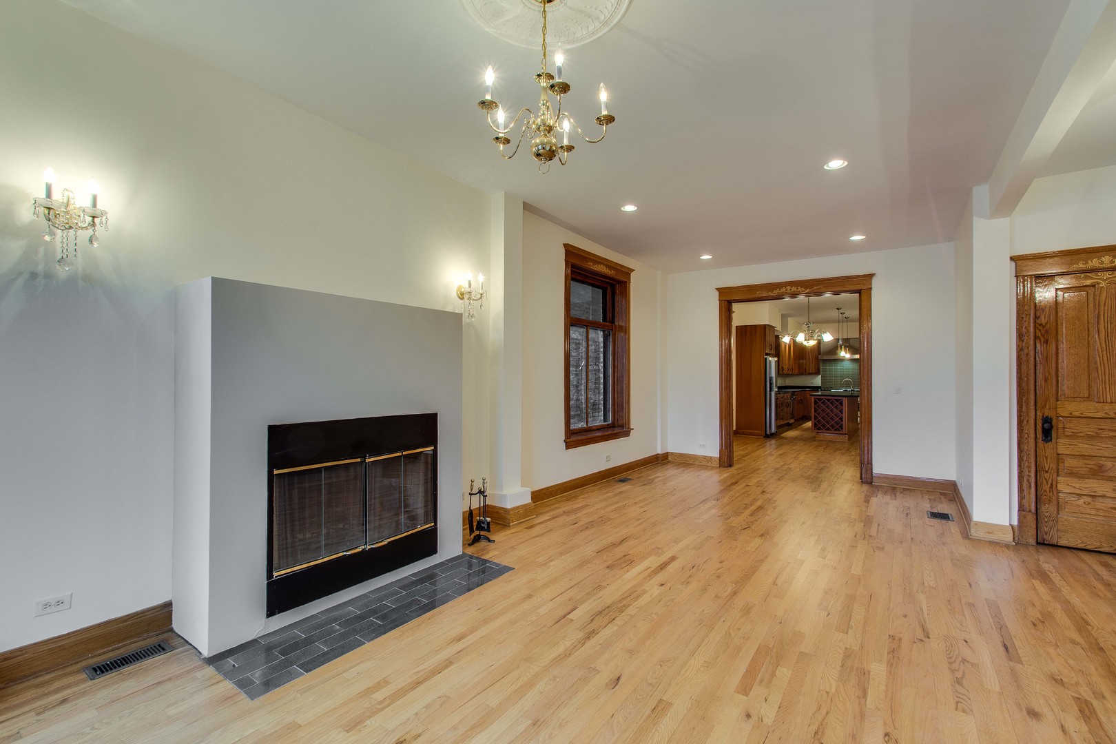 2905 West Logan Boulevard Chicago, IL 60647 - Photo 4 of 36 a view of an empty room and fire place