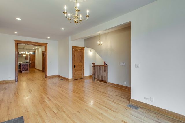 a view of a livingroom with wooden floor